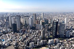 US Air Force photo 170903-F-PM645-1558 An aerial view of Shinjuku’s skyscraper district from a UH-1N Iroquois